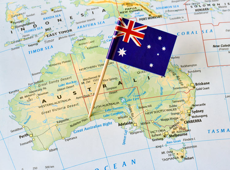 An Australian pin flag pinned to a map of Australia