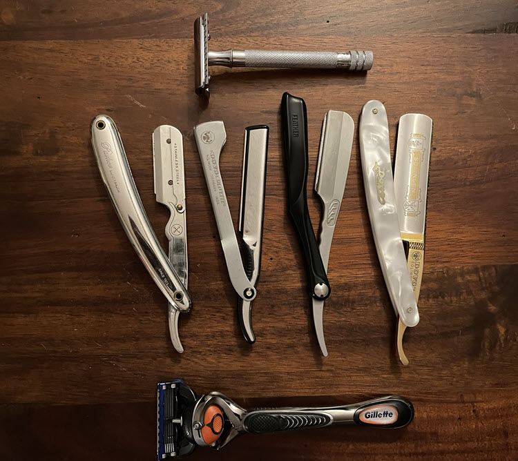 An image of a Merkur 180 long handle safety razor, Parker shavette, Dovo shavette, Feather Artist club razor, Dovo straight razor, and Gillette Fusion ProGlide cartridge razor.