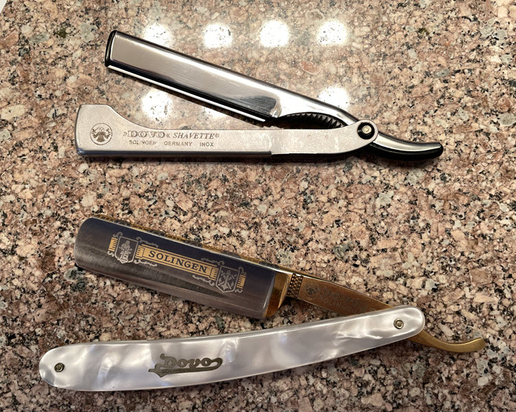 Dovo shavette and straight razor sitting on top a bathroom sink counter